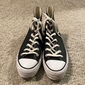 Black and white leather converse